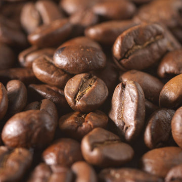 Rich dark roast coffee brewed fresh, representing Willow and Bloom Coffee