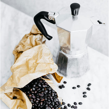 Freshly brewed coffee in a rustic ceramic cup from Willow and Bloom Coffee