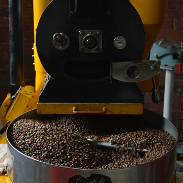 Warm cup of coffee brewed with high-quality beans from Willow and Bloom Coffee