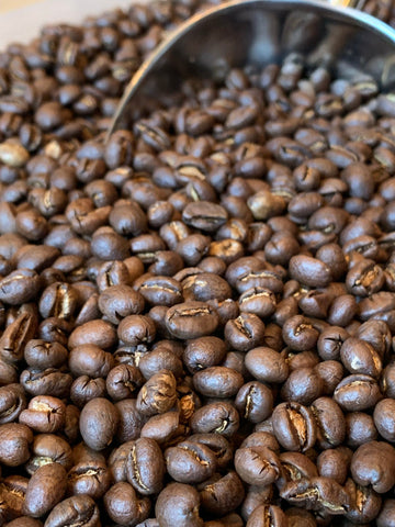 Steaming cup of coffee showcasing Willow and Bloom's signature blends